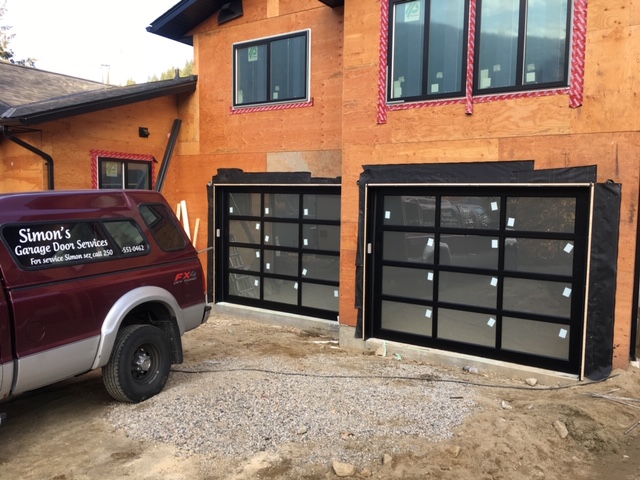 Installing Metal and Glass Door on New House